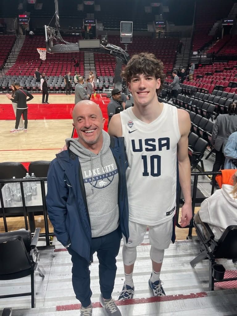 Kelly Reed with Blake Buchanan in a USA Basketball uniform